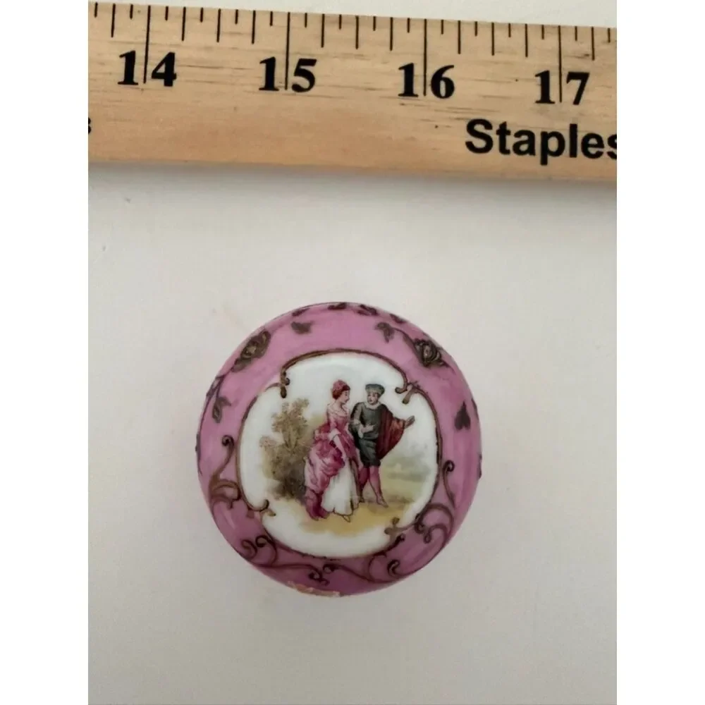 Vintage Limoges style trinket box with courting couple